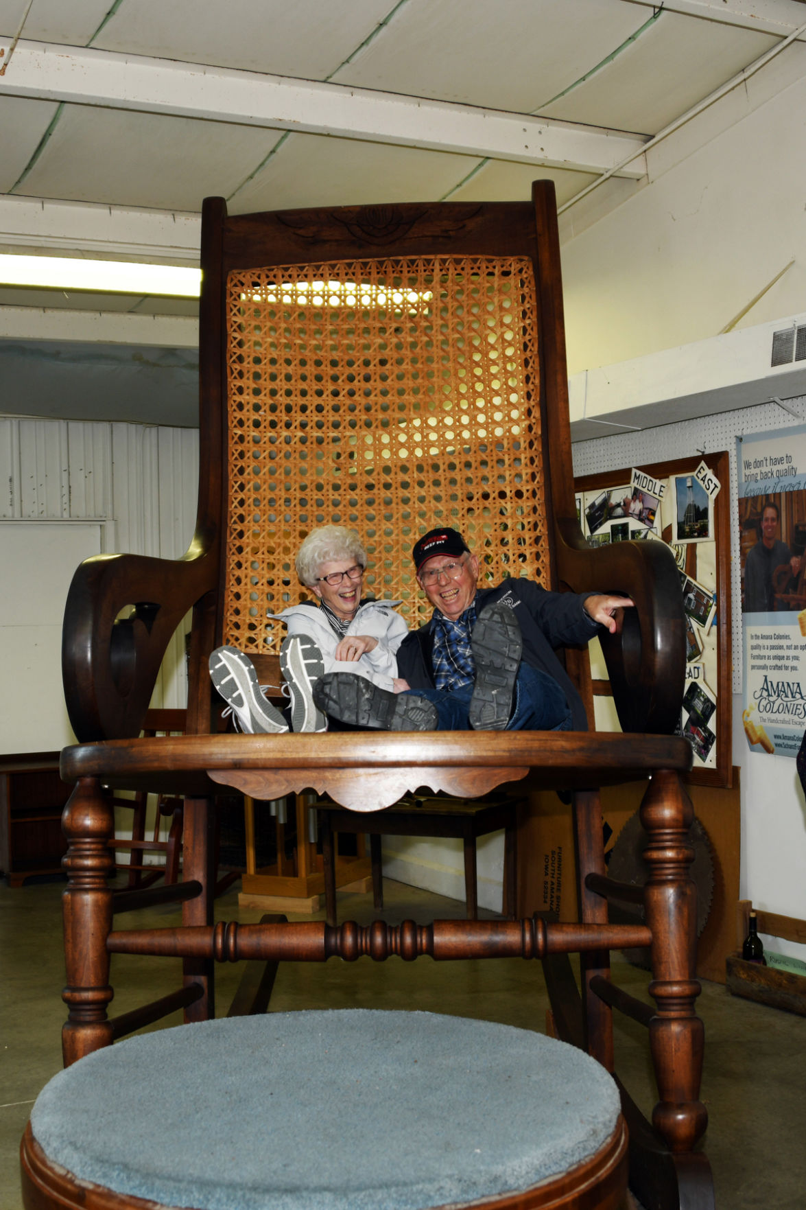 012 Darlene and Arvid Janzen on Iowa's largest solid walnut rocker.JPG
